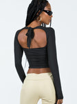 Long sleeve top Halter neck detail Tie back fastening Cut out detail at front & back Ruched sides