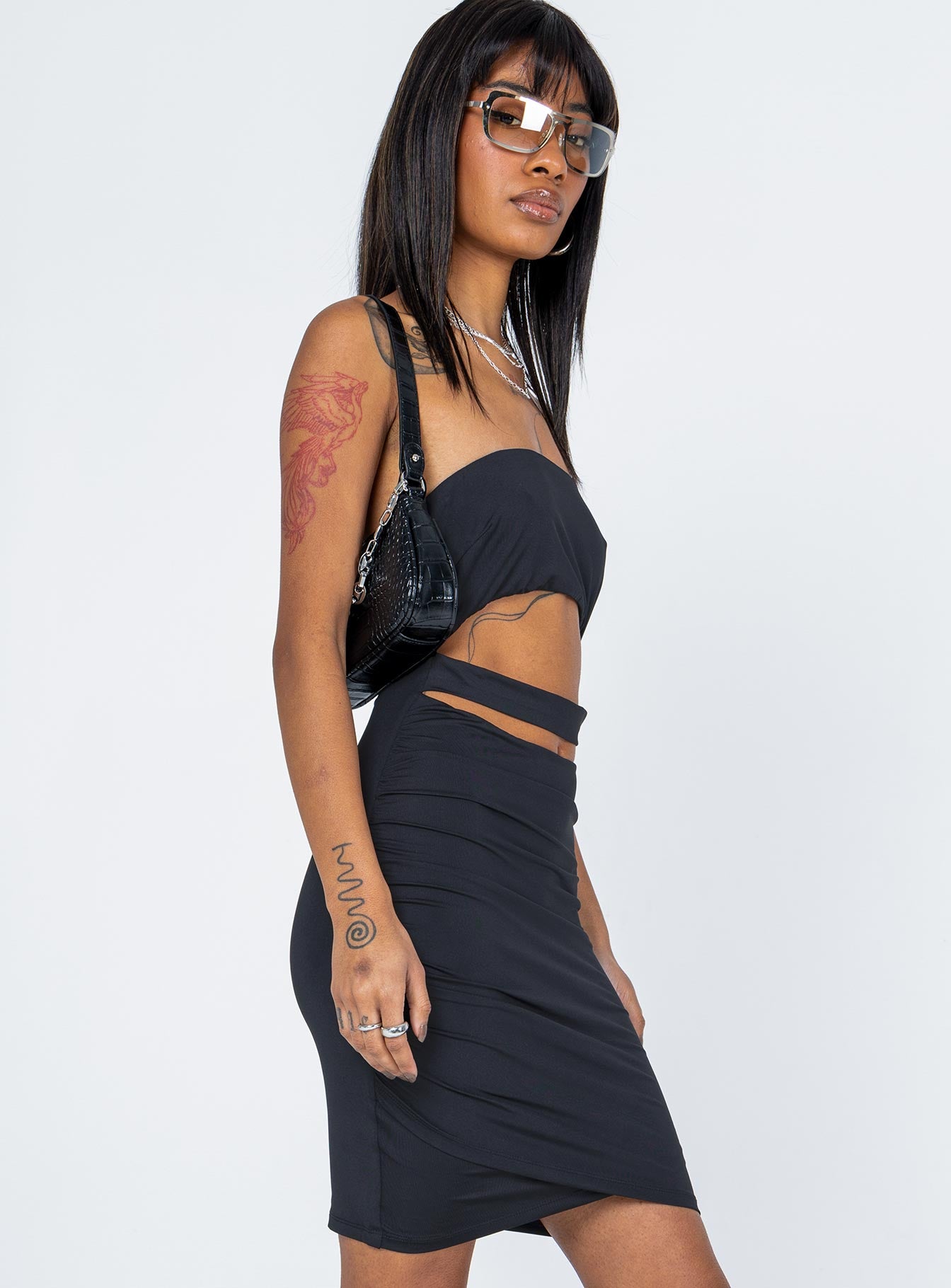 side view of model wearing Princess Polly Karlo Mini Dress Black 