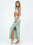 Matching set Ribbed material Crop top Twisted bust High waisted skirt High side slit  Twist detail at waist Lined top