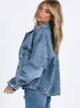 Oversized jacket Mid wash denim Classic collar Drop shoulder Button fastening at front Oversized chest pocket Single button cuff