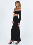 Black matching set Long sleeve crop top Off the shoulder design Knot detail at bust Maxi skirt Thin elasticated waistband Good stretch Partially lined