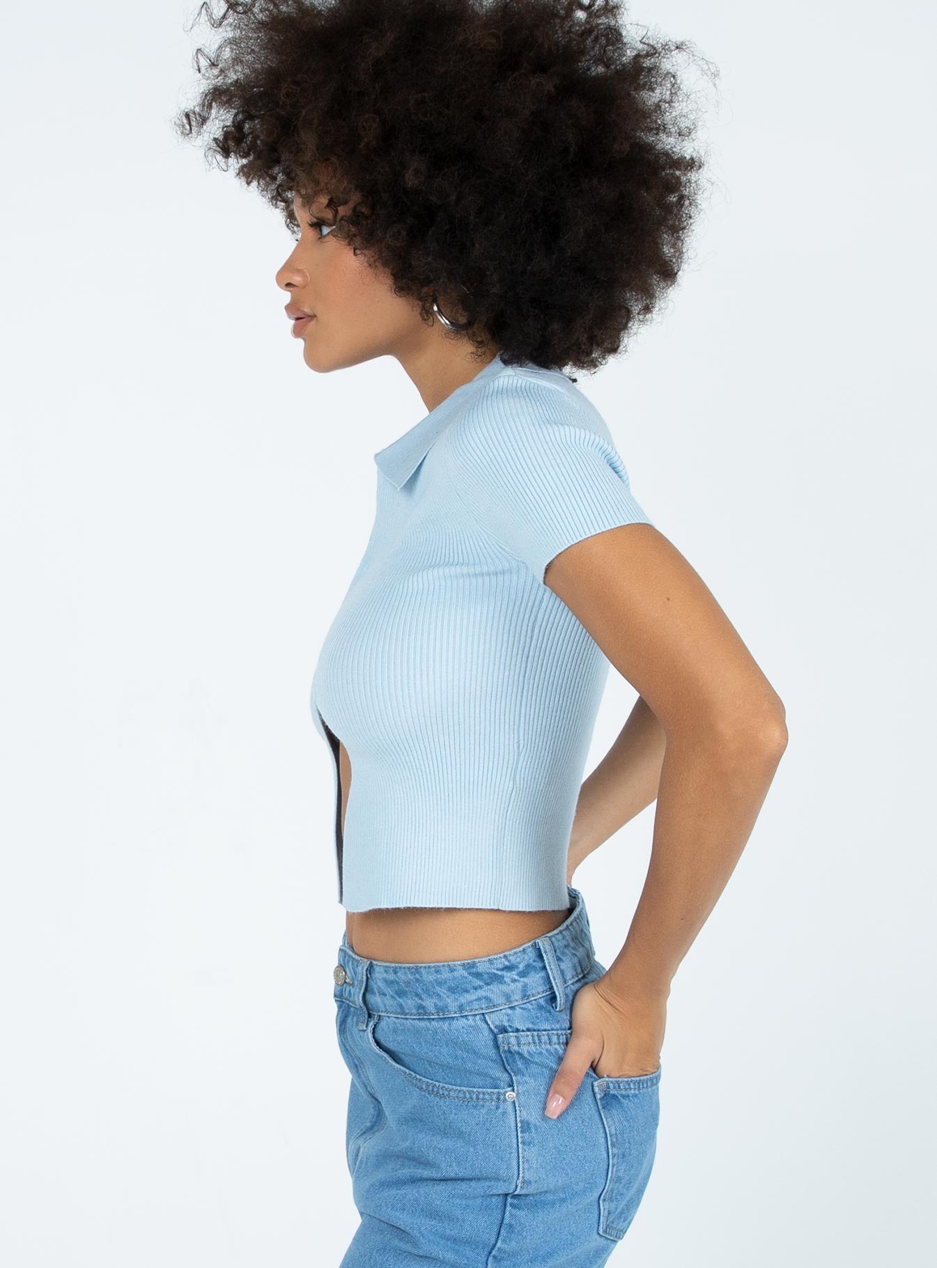 side view of model wearing Princess Polly Clayton Top Blue 