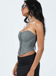 Corset top Mesh material  Inner silicone strip at bust  Boning throughout  Hook & eye front fastening 