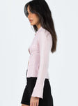 Long sleeve top Sheer material  Classic collar  Latch fastening at bust Flared cuffs  Non-stretch