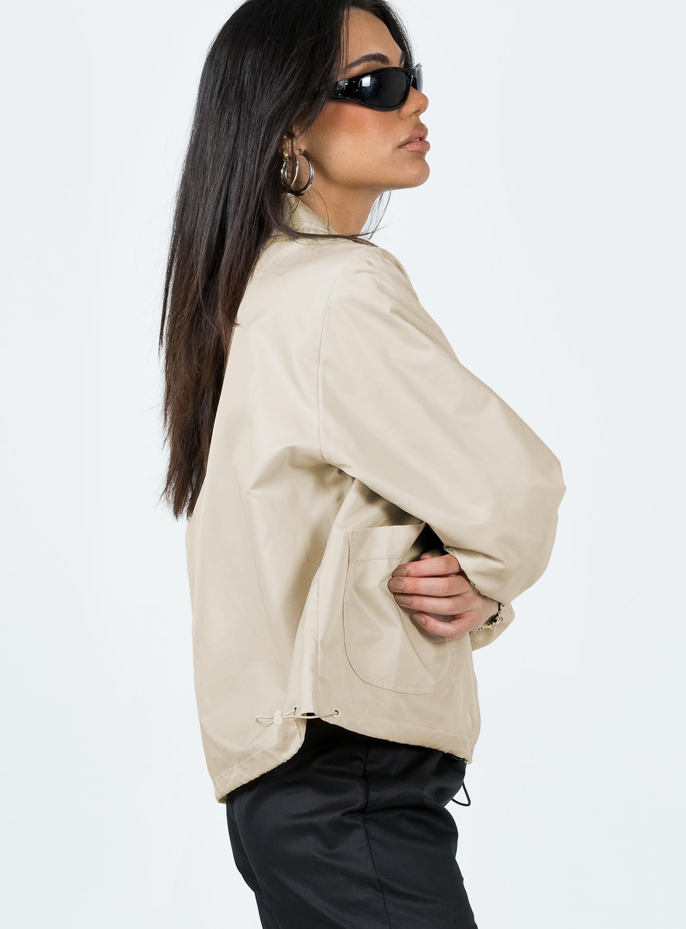 Jacket High neck Zip fastening at front Faux zip chest pocket  Twin hip pockets Drawstring waist Elasticated cuffs