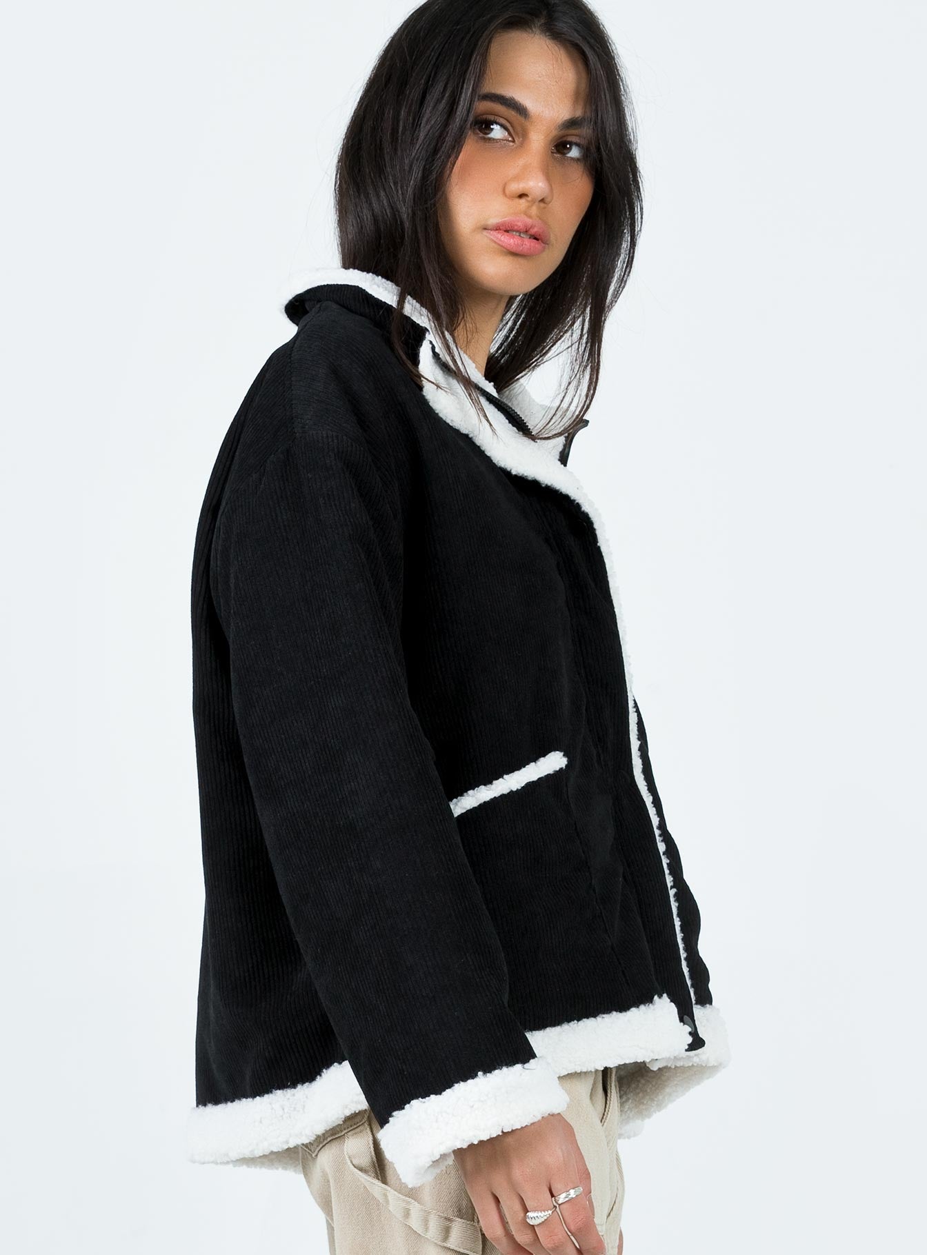 Jacket Corduroy material Faux fur lining & trim High neck Zip & button fastening at front Twin hip pocket