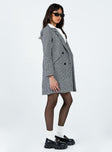 Oversized coat Houndstooth print Soft knit material Double button fastening Twin hip pockets Longline design Fully lined
