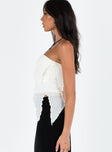 White top Popcorn material Thin elasticated band at bust Asymmetric hem Good stretch Partially lined