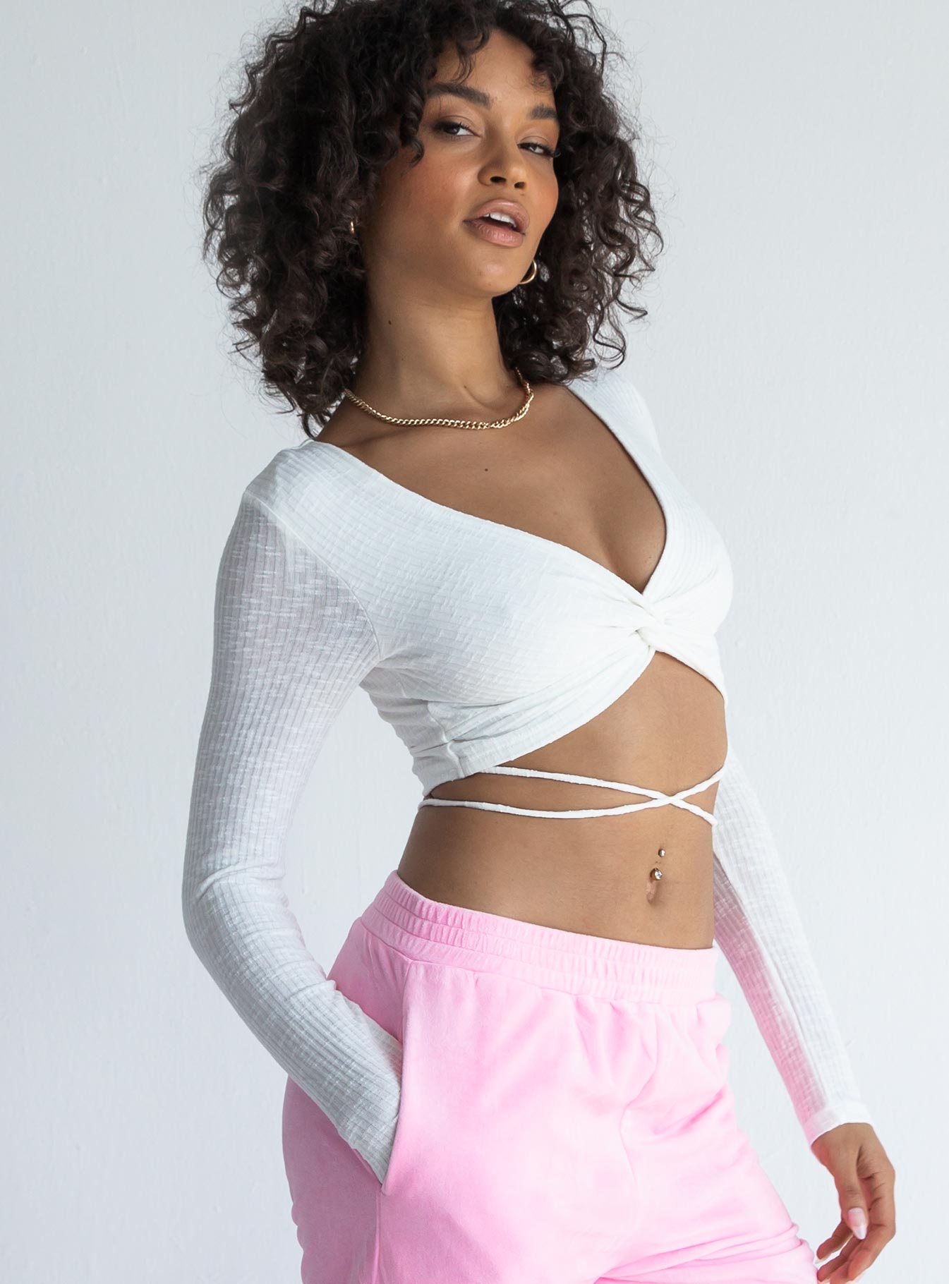 front view of model wearing Princess Polly Despina Long Sleeve Top White 