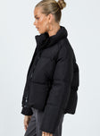 Oversized puffer jacket High neck  Zip front fastening  Twin hip pockets 