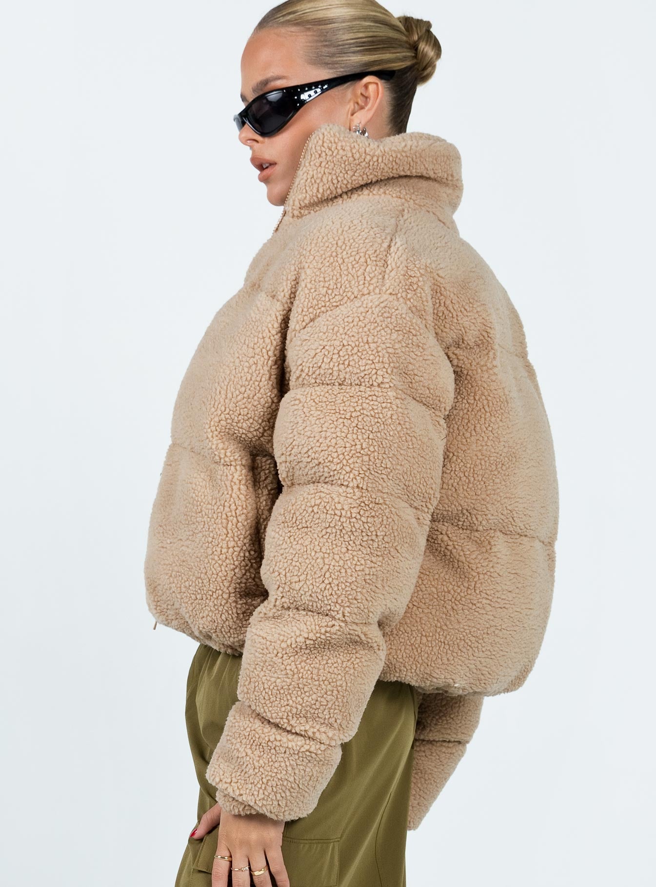 Puffer jacket Sherpa material  Turtle neck Zip fastening at front  Twin hip pockets  Fully lined 