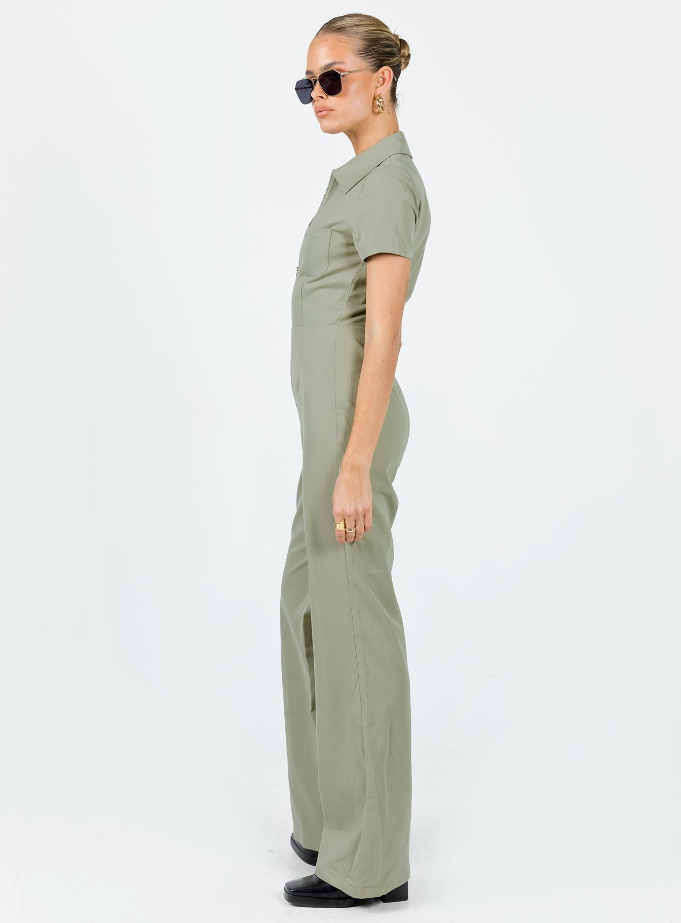 Jumpsuit Classic collar Zip fastening at front Twin chest pockets Straight leg