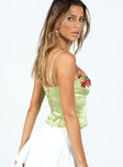 Green crop top Silky material Adjustable shoulder straps Embroidered detailing at bust Wired cups Zip fastening at back
