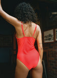 One piece Adjustable straps V-neckline Shirred bust Wired cups Brief style bottom Removable padding