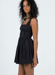 side view of model wearing Princess Polly Lorinda Mini Dress Black Square Neck 