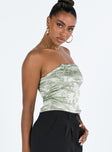 Green strapless top Silky material Floral print Inner silicone strip at bust Zip fastening at back