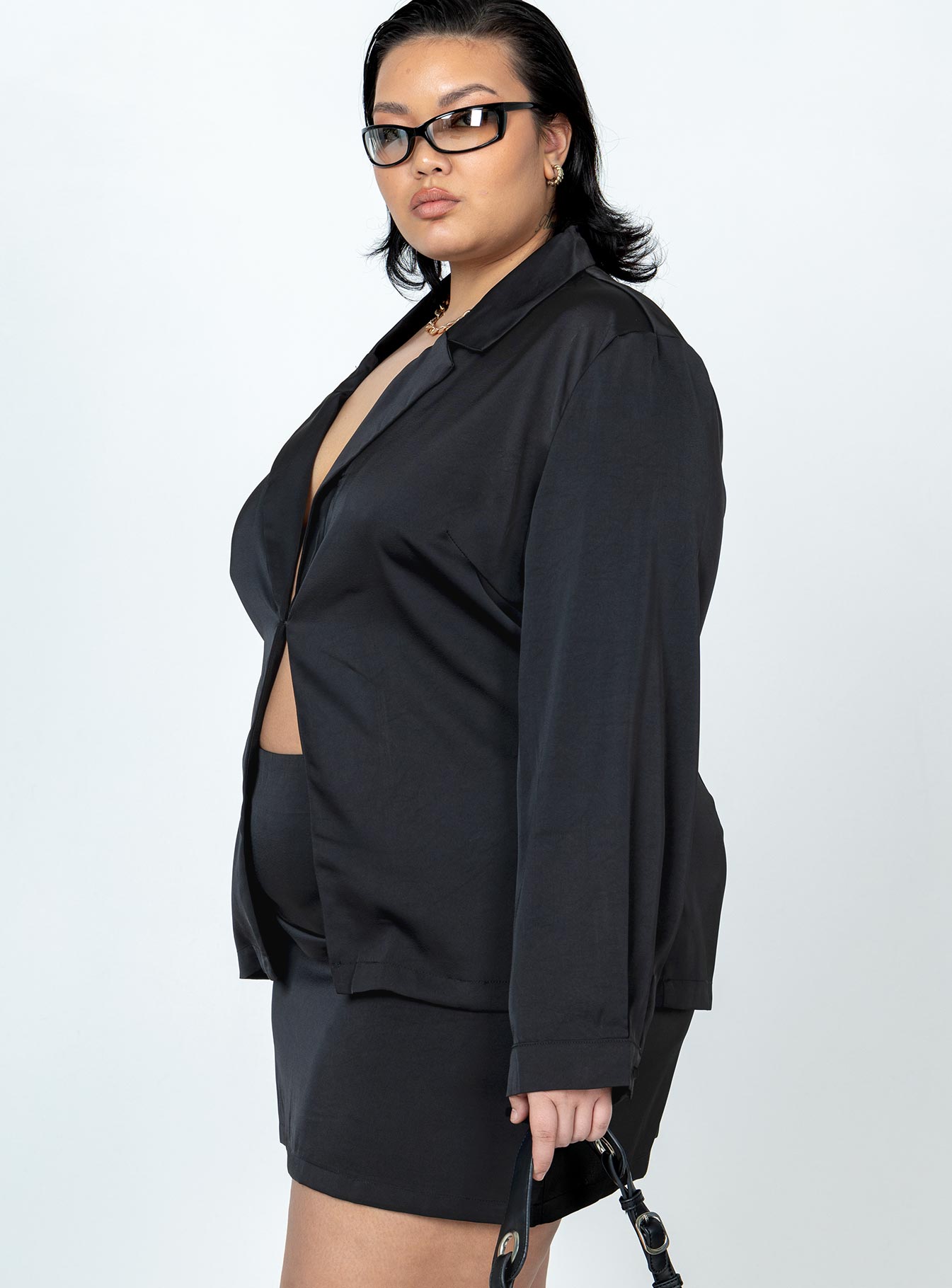 Matching set Long sleeve top  Lapel collar  Hook fastening  Mini skirt  Invisible zip fastening at side Spare button included 