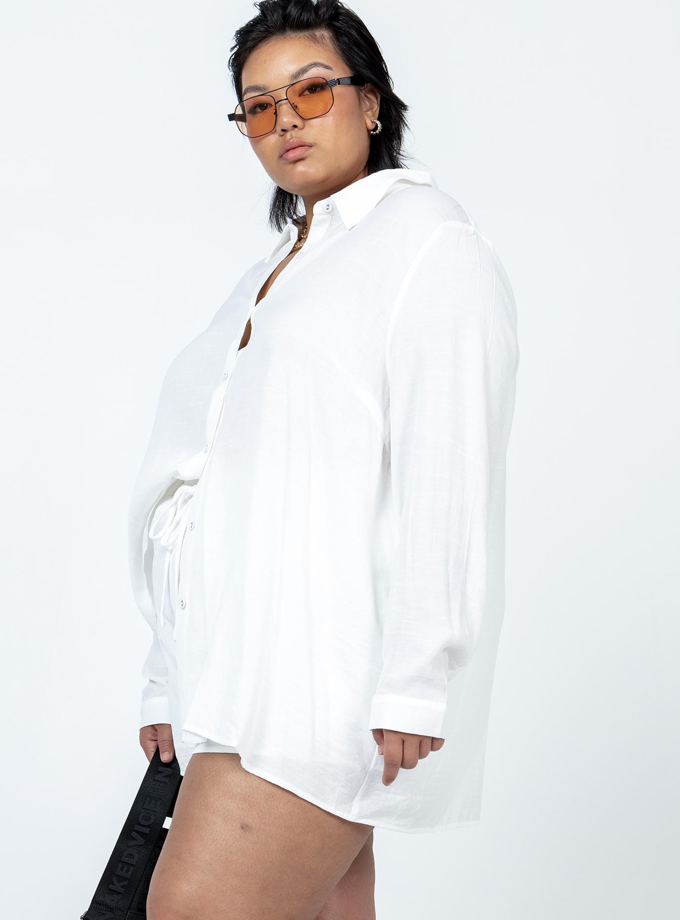 Matching set Button front shirt Single-button cuff Relaxed fitting High waisted shorts Elasticated drawstring waistband Lined shorts