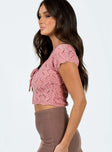 Top Knit material Open neckline Adjustable ruching with tie fastening Cap sleeves