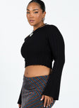 Long sleeve top Ribbed knit material  Off the shoulder design  Flared sleeves Good stretch  Unlined 