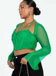 Green long sleeve top Mesh material  Halter neck tie fastening  Wired cups Boning through front  Invisible zip fastening at side  Sheer sleeves Good stretch  Lined body 