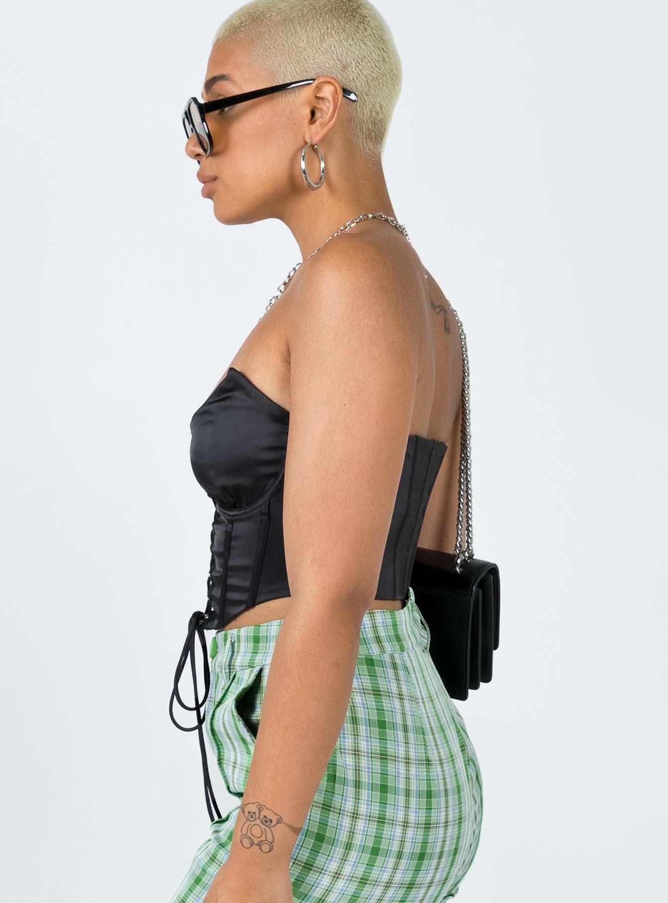 side view of model wearing Princess Polly Palma Corset Top Black 