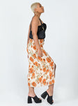Midi skirt  100% polyester  Floral print  Crinkle material  Elasticated waistband  High side slit 