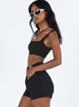 Black matching set Crop top Fixed straps Invisible zip fasting at side High waisted shorts Belt loops at waist Zip and button fastening Sutble pleats at waist Twin hip pockets Non stretch  Lined top