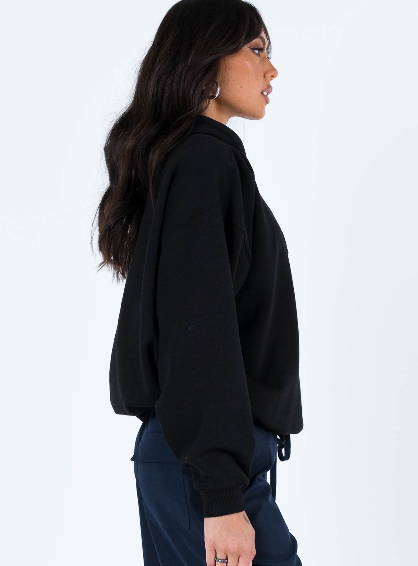 side view of model wearing Princess Polly Ritu Oversized Hoodie Black 