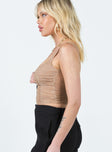 Cropped top Sheer mesh material Ruched design Scooped neckline