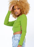 side view of model wearing Princess Polly Leonardo Long Sleeve Top Green 