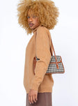 side view of model wearing Princess Polly Larissa Sweater Brown 