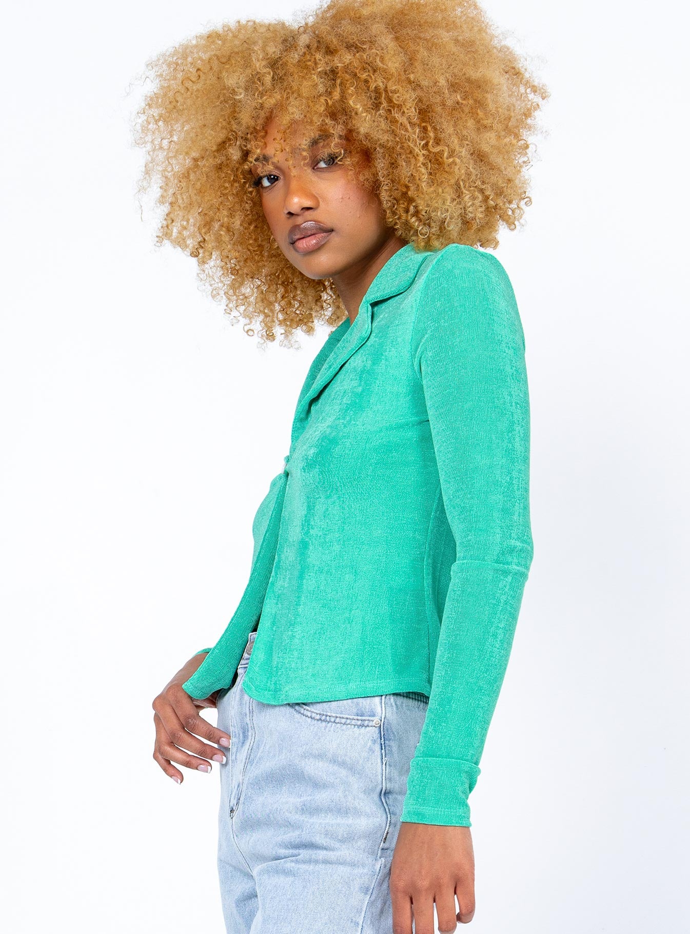 side view of model wearing Princess Polly Andi Long Sleeve Top Green 