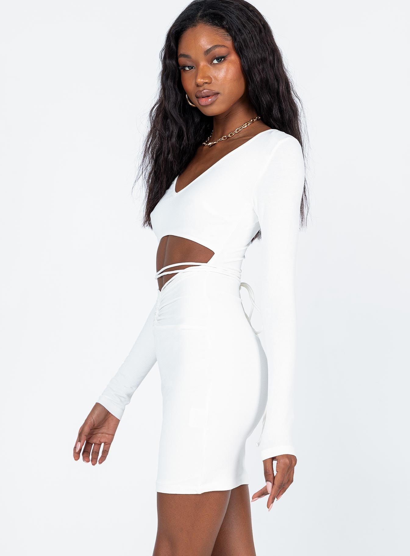 side view of model wearing Princess Polly Noa Mini Dress White 