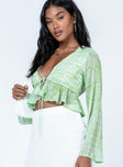 Green long sleeve top 100% polyester  Chiffon material  Printed design  Plunging neckline  Tie front fastening  Frill hem  Flared sleeves  Non-stretch Lined bust 