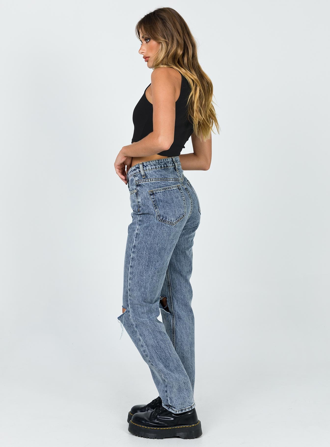 side view of model wearing Princess Polly Intentions Straight Leg Knee Rip Denim Jean High Waisted 