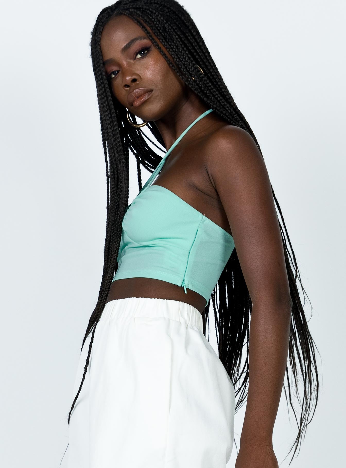 side view of model wearing Princess Polly Andre Top Green 