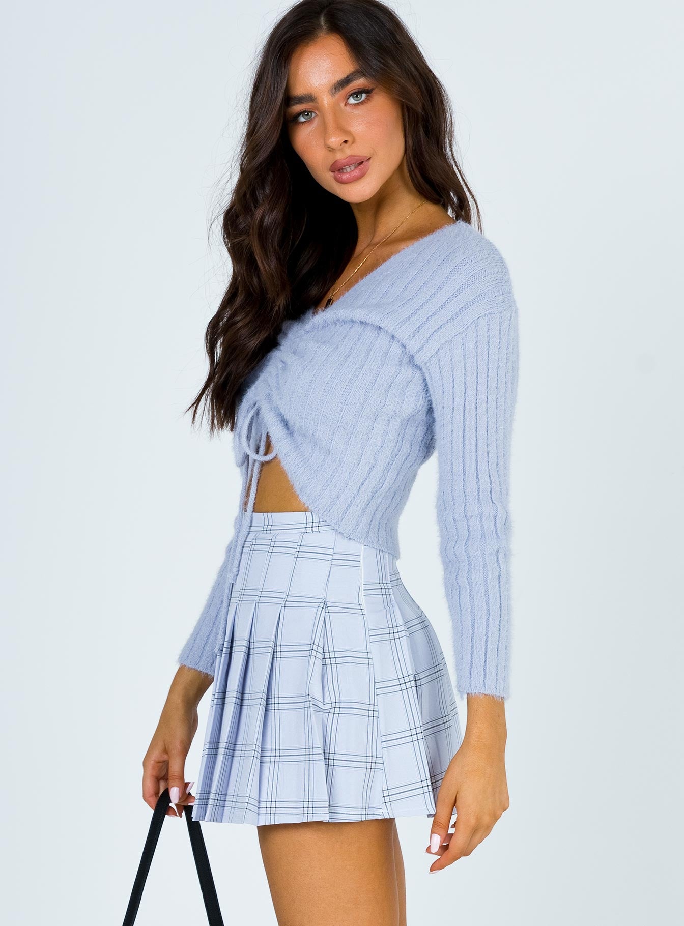   side view of model wearing Princess Polly No Boundaries Mini Skirt 