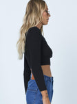 side view of model wearing Princess Polly Jax Long Sleeve Top Black 