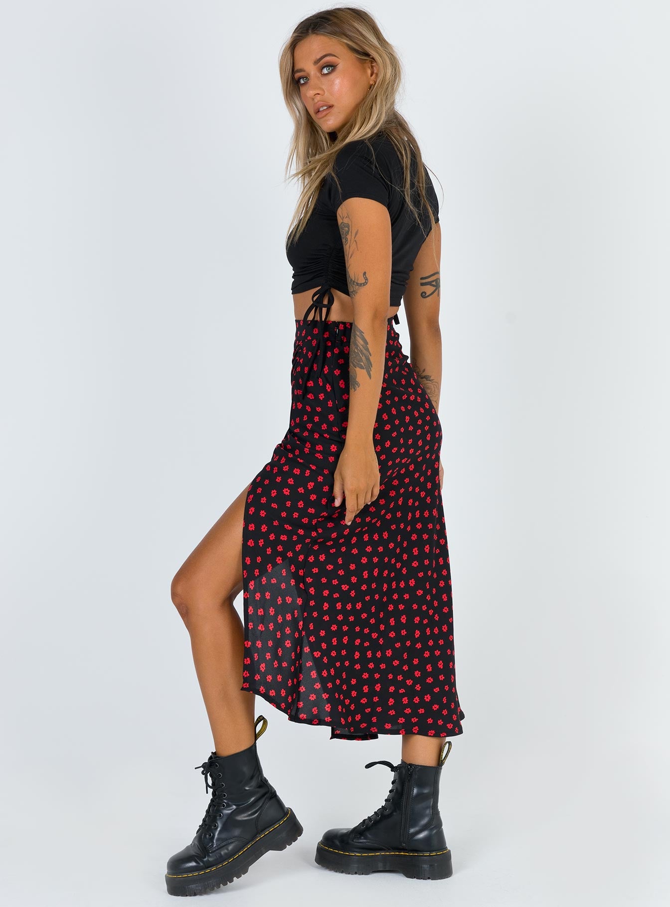   side view of model wearing Princess Polly Mabel Midi Skirt 