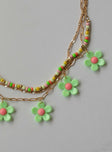 Necklace Gold-toned chains Lobster clasp fastening Beaded detail Flower design