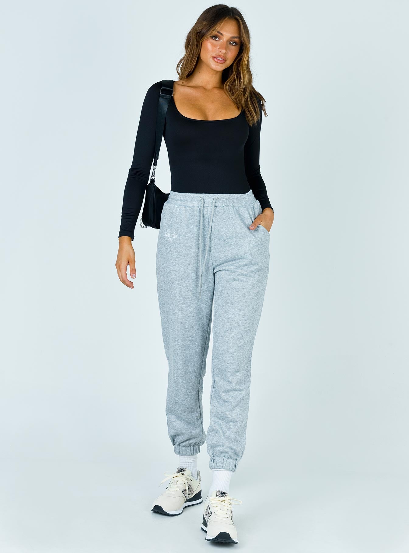 front view of model wearing Princess Polly Ellery Bodysuit Long Sleeve Tops 