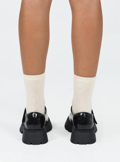 Loafers Faux patent leather Platform base Velcro fastening strap Rounded toe Treaded sole Padded footbed