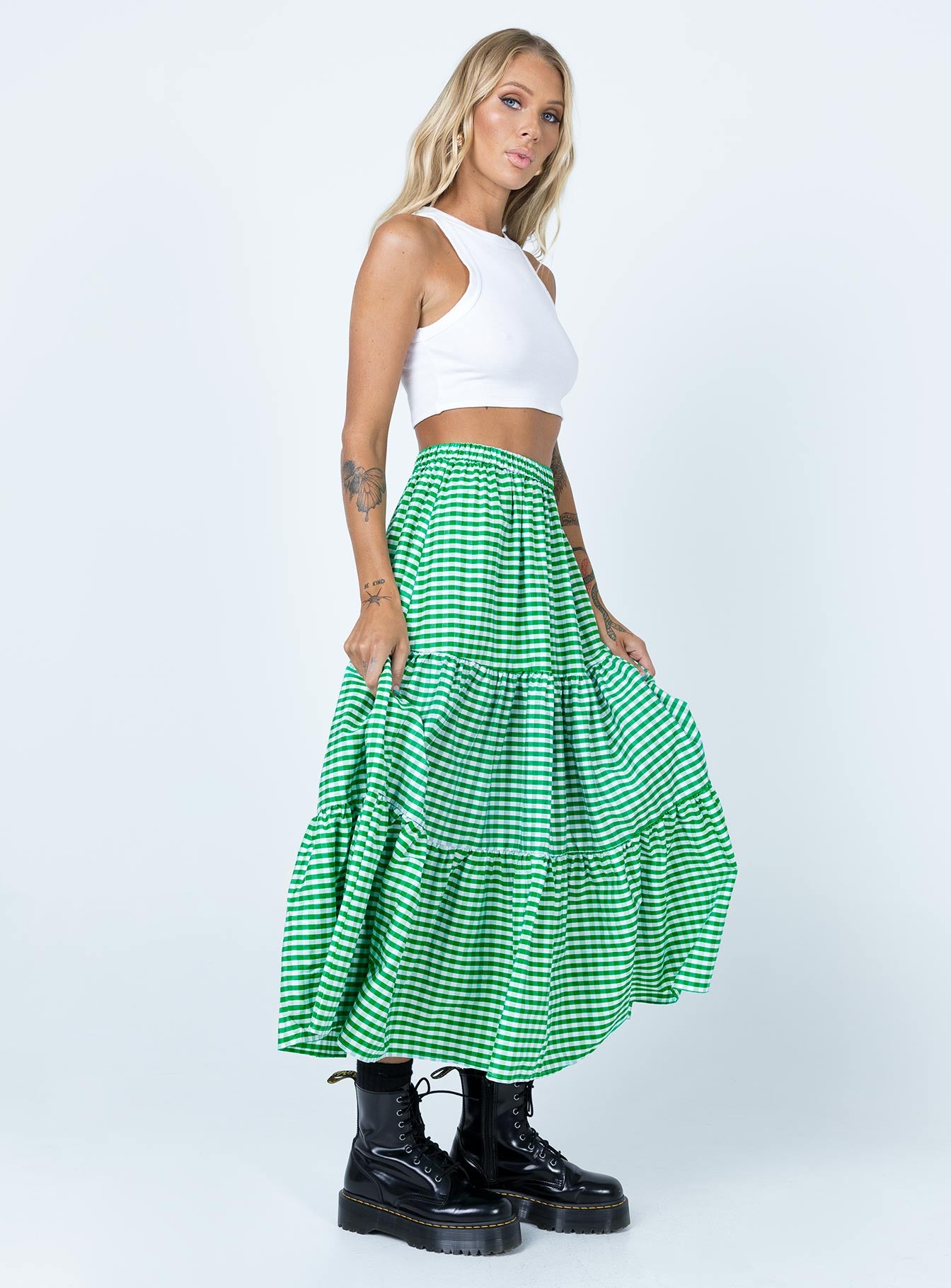   side view of model wearing Princess Polly Hale Midi Skirt Green 
