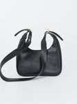 Shoulder bag  Faux leather material  Adjustable shoulder strap  Gold-toned hardware   Zip fastening  Single internal zip pocket  Flat base 