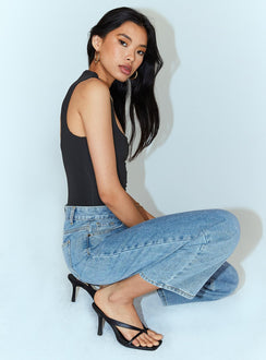 back view of model wearing Princess Polly Molly Asymmetric Bodysuit Black Sleeveless 