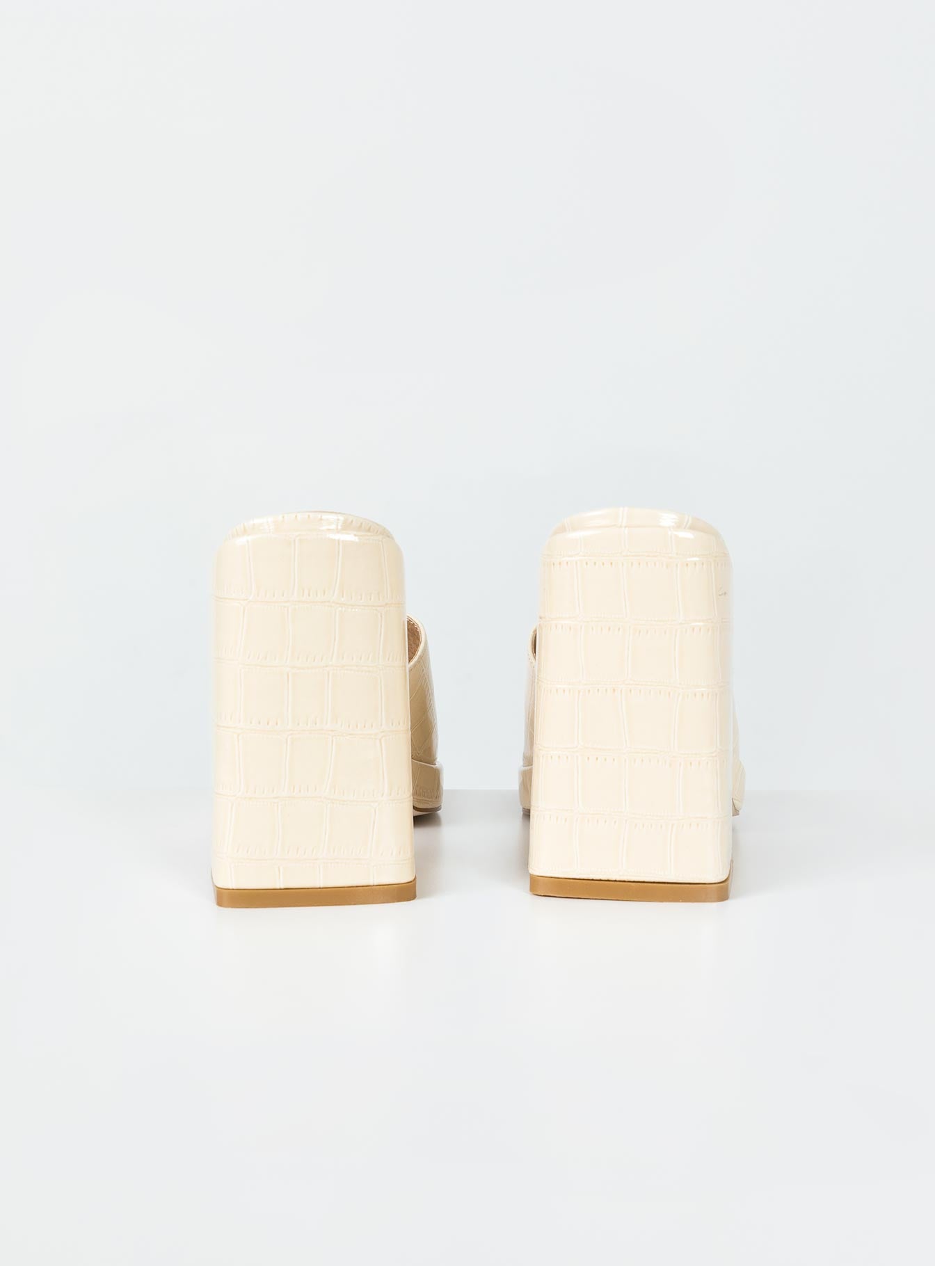 Heels Faux croc print  Single wide upper  Square toe  Block heel 