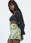   side view of model wearing Princess Polly Selby Mini Skirt Multi 