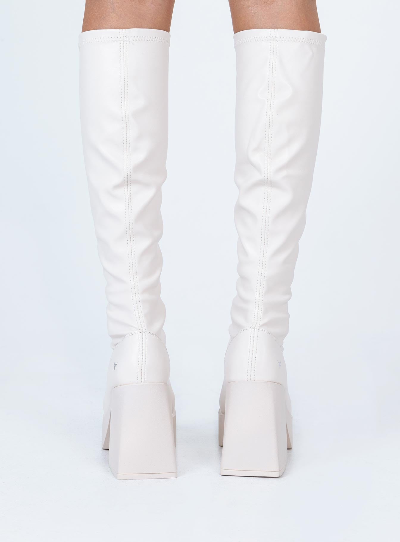 Boots  Faux leather material  Fitted at leg  Block heel Platform base  Square toe  Good stretch 