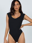 front view of model wearing Princess Polly Carey Bodysuit Black Short Sleeves Scoop Neck 